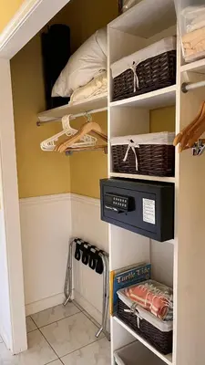 a walk in closet with shelves and baskets at Pacific View Condominium in Playa Azul in Playa Azul