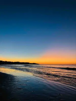 a view of the beach at sunset at Casa Ophelia in Tamarindo