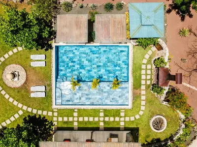 an overhead view of a swimming pool in a yard at Buendía Lux Piña Suite Hidden Gem Near Beach with Pool in Potrero