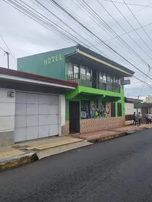 a hotel on the side of a street at Hotel Paradise Alajuela in Alajuela City