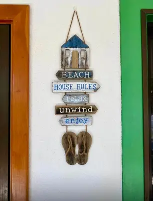 a sign that reads beach house rules and happy universal entry at Golf Beach House w/ Pool (5 min. walk to beach!) in Tambor