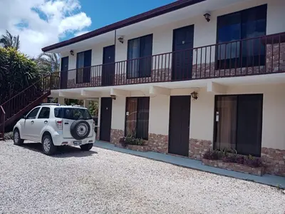 a white suv parked in front of a house at Bed and breakfast Bachelor in Sagrada Familia