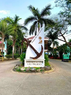 a sign for the university of las palmas at Rooftop Sunset Cove in Liberia