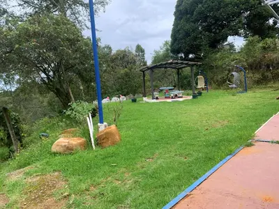 a park with a playground with at Cabaña Mamá Elia in Trinidad