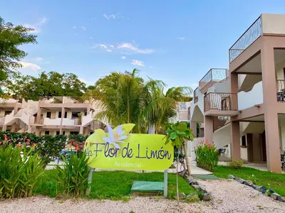 a sign in front of a building at High Tide 2 bed1 bath condo Terrace in Coco