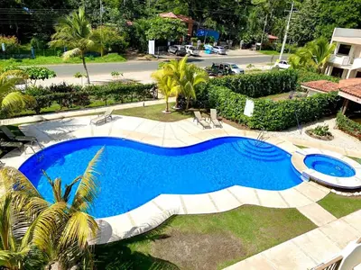 an overhead view of a swimming pool in a yard at Sun and Waves Getaway in Coco