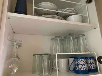 a cupboard filled with lots of plates and dishes at Discounted - PuraVida Escape and rooftop terrace in Coco