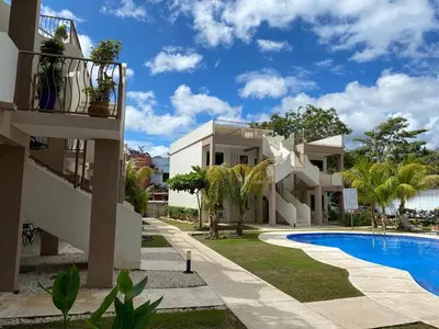 a view of a building with a swimming pool at Discounted - Beach Dreams Coco Ground Floor Unit in Coco