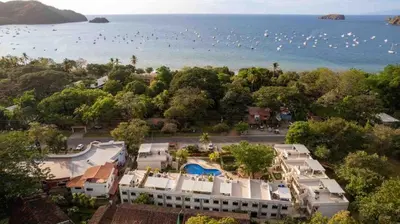 an aerial view of a resort and the ocean at Discounted - Beach Dreams Coco Ground Floor Unit in Coco