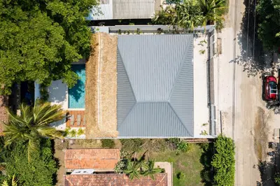 an overhead view of a house with a gray roof at Tropical brand new 4 BR gem in Potrero near beach - Casa Marzo in Potrero
