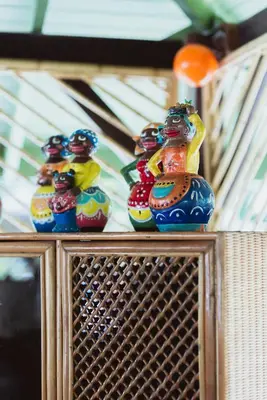 a group of vases sitting on top of a table at Mawamba Lodge in Tortuguero