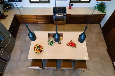 an overhead view of a table in a kitchen with food on it at Casa Ola Vista - by Pura Villas in Dominicalito