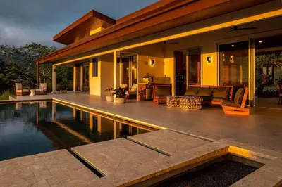 a house with a swimming pool in front of it at Casa Grande del Mar - by Pura Villas in Punta Mala