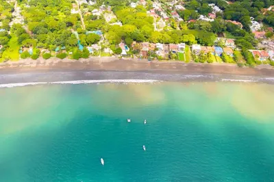 an aerial view of a beach with boats in the water at Casa Harmonia- 2 Br House With Pool in Potrero