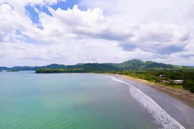 an aerial view of a beach with mountains in the background at Casa Harmonia- 2 Br House With Pool in Potrero