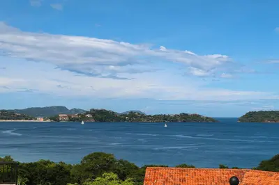 a view of a large body of water with boats in it at Villas Catalina 7 in Potrero