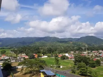 a view of a town with mountains in the background at Jaco Bay 4903 Three bdrm Suite Spectacular Views Pool in Jacó