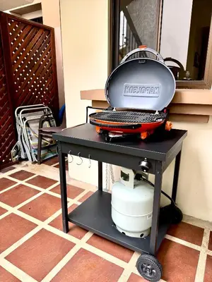 a grill sitting on a table on a table at The Beach House Ground Floor Condo in Coco