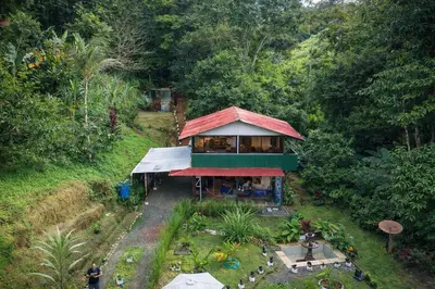 an overhead view of a house in a forest at Tropical Quiet Retreat in Venecia