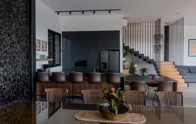 a dining room with a table and some chairs at Villa Setai - Full Ocean view in Santa Teresa Beach