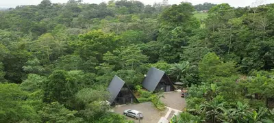 an aerial view of a house in the forest at Yarumo Lodge, Río Celeste Black Chalets in Bijagua