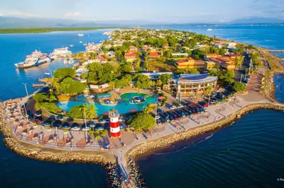 an island in the water with a resort at Relax at Pier Sands Casita#1 - Close to the Beach! in Puntarenas