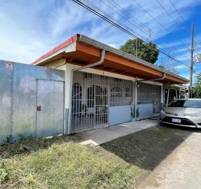 a car parked in front of a building at Relax at Pier Sands Casita#1 - Close to the Beach! in Puntarenas