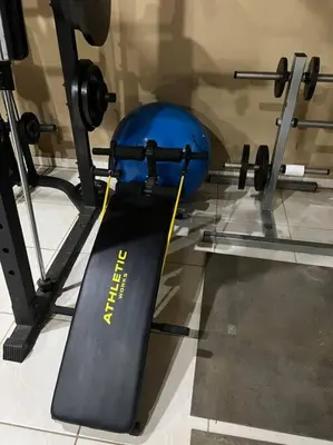 a snowboard on display in a gym with weights at 1 Bedroom with pool and walking distance to beach in Tamarindo