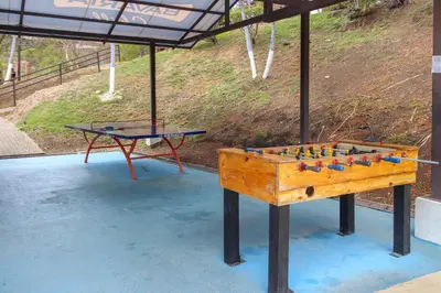 a ping pong table and a ping pong table at Villa Sol 35 & 36 in Playa Hermosa
