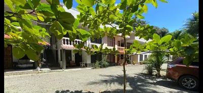 a car parked in front of a house at Apto Cielo Azul in Manuel Antonio