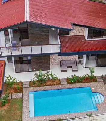 an aerial view of a house with a swimming pool at Hector House in Uvita