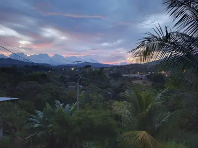 a view of a forest with mountains in the distance at Casa Victoria CR in San Isidro