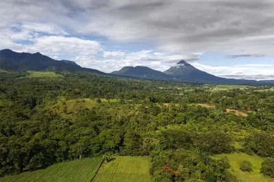 an aerial view of a mountain in the distance at Hotel Heliconias Nature Inn & Hot Springs in Fortuna
