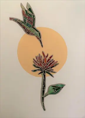 a bird flying over a flower on a wall at Lovely studio-apartment near the beach in Uvita