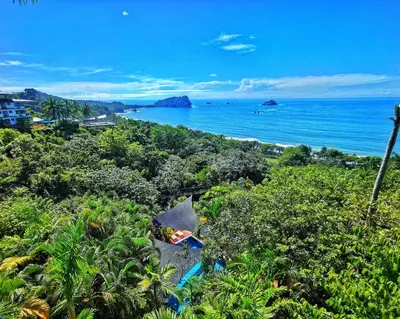 an aerial view of a beach with the ocean at Hotel Costa Verde in Manuel Antonio