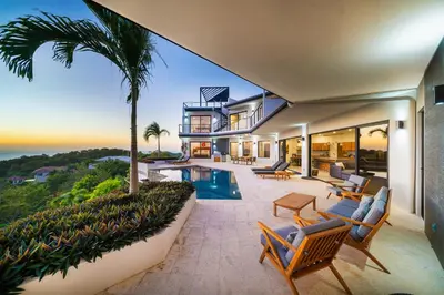 a house with a view of the ocean at Villa Vista Pacifico - Serene Villa, Ocean View Pool, Rooftop Deck, 5 BR in Potrero