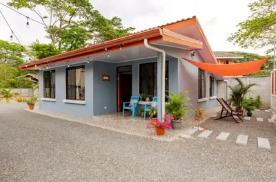a small house with a patio at Casa en Playa Tambor - A 5 minutos de la playa in Tambor