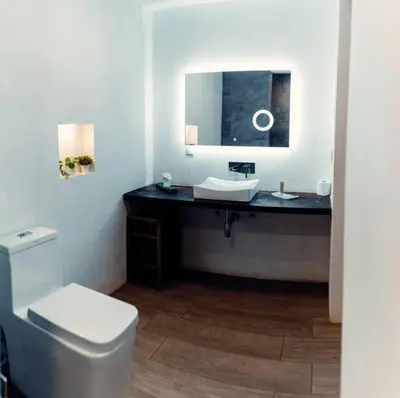 a bathroom with a sink and a toilet at Luxury Villa Carao - Serene Amazing Views at Finca Chilanga in San Mateo