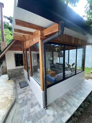 a house with a view of the ocean at Cabaña de Montaña Flaki's in Monteverde Costa Rica