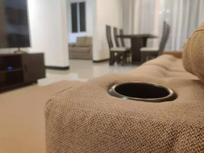 a close up of a couch in a living room at Condo en Jacó in Jacó