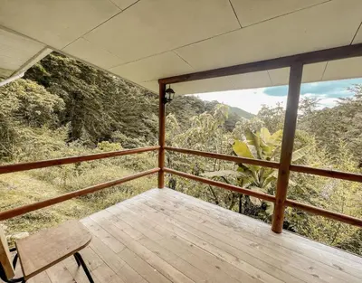 a balcony with a view of the mountains at Hacienda La Lucha in Lucha