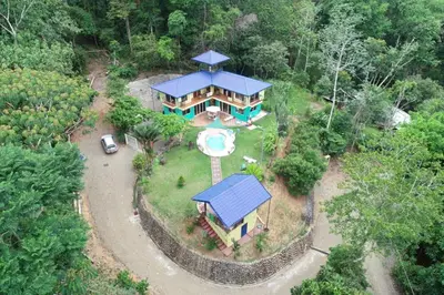 an aerial view of a house with a pool at YETHAN HOUSE in Uvita