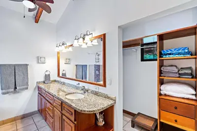 a bathroom with a sink and a mirror at Inviting Home with Colorful Decor and Private Backyard Oasis with a Swimming Pool & Shaded Terrace in Santa Cruz