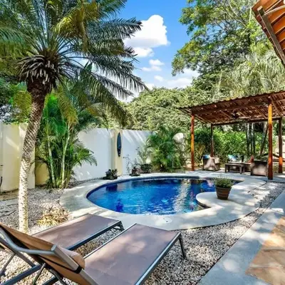 Inviting Home with Colorful Decor and Private Backyard Oasis with a Swimming Pool & Shaded Terrace