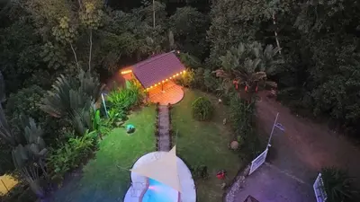an overhead view of a house with an umbrella at YETHAN HOUSE in Uvita