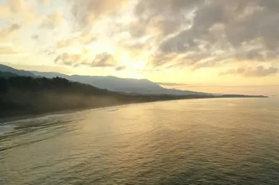 a view of a body of water at sunset at Sharma Costa Rica- Mimosa Casita in Uvita