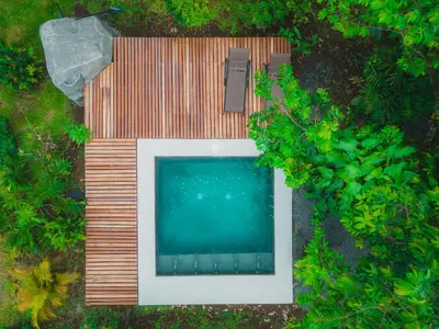 an overhead view of a swimming pool in a yard at Arenal Getaway in Fortuna