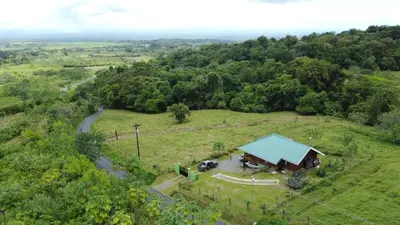 an overhead view of a barn in a field with a road at Cabaña de la Montaña in Río Cuarto
