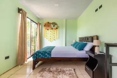 a bedroom with a bed and a window at Vacation Home Bartenderluisch in Fortuna