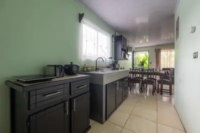 a kitchen with a sink and a counter top at Vacation Home Bartenderluisch in Fortuna